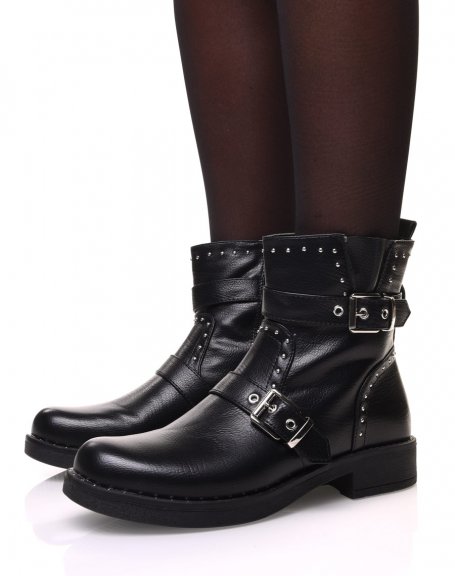 Black ankle boots with straps and adorned with small round studs