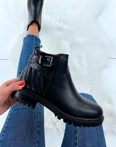 Black ankle boots with straps and red interior