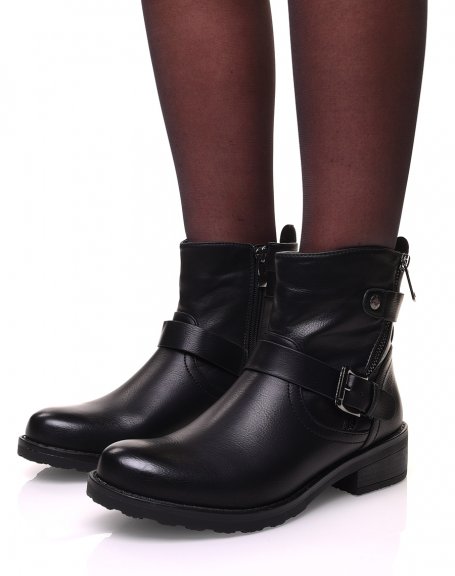 Black ankle boots with straps and zippers