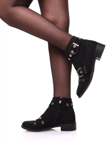 Black ankle boots with studded straps open at the front