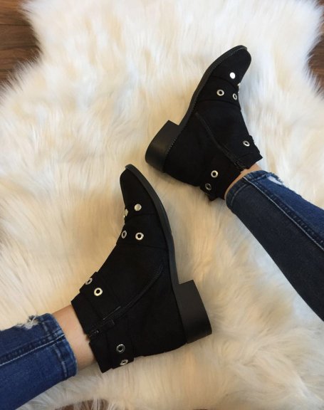 Black ankle boots with studded straps open at the front