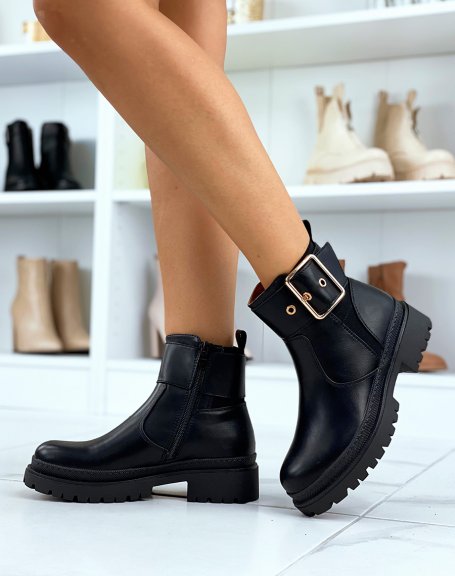 Black ankle boots with thick and golden strap