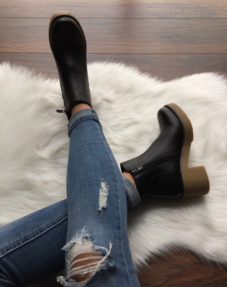 Black ankle boots with thick contrasting sole