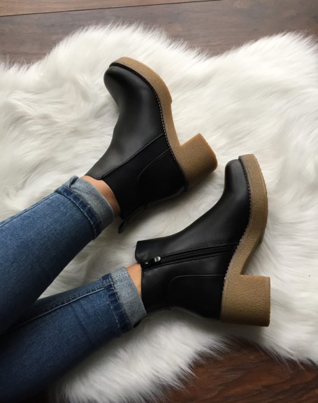 Black ankle boots with thick contrasting sole