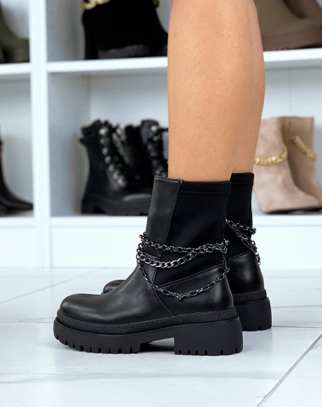 Black bi-material ankle boots adorned with chains