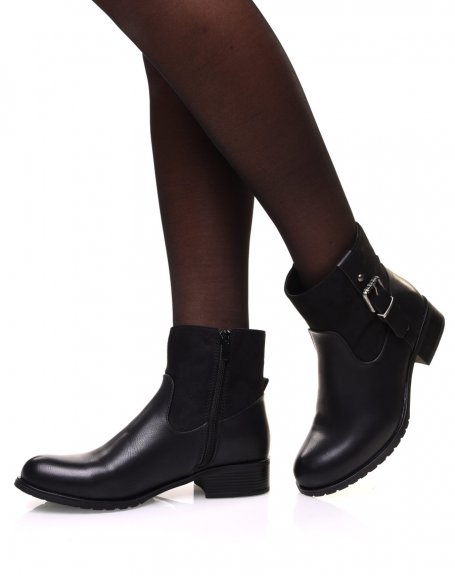 Black bi-material ankle boots with decorative strap on the side