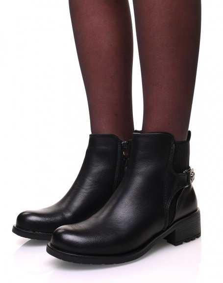 Black bi-material ankle boots with decorative straps