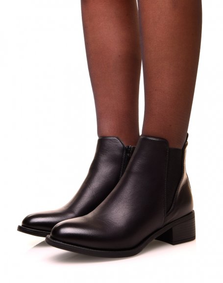 Black bi-material ankle boots with notched soles