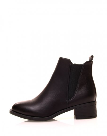 Black bi-material ankle boots with notched soles