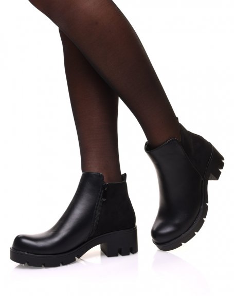 Black bi-material ankle boots with small heel and notched sole