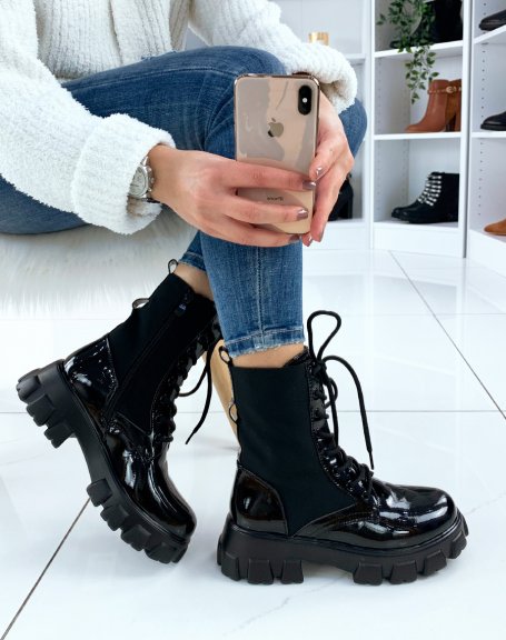 Black bi-material boots with notched soles with pocket