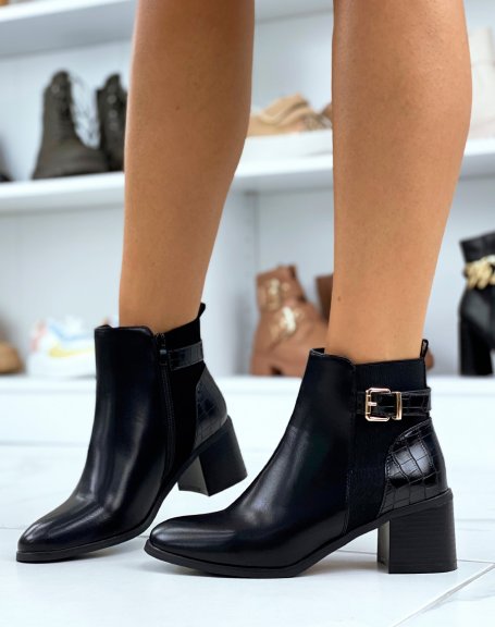 Black bi-material heeled ankle boots with golden strap