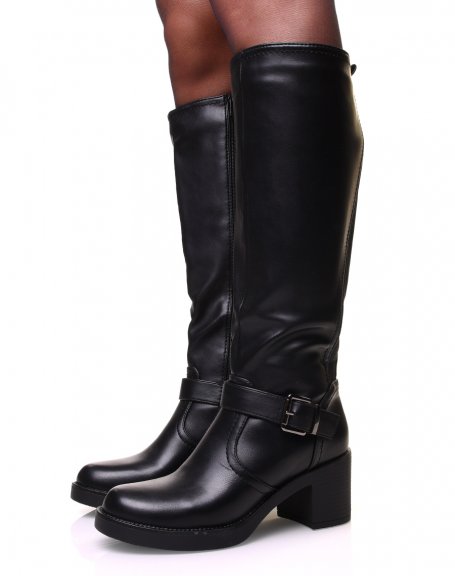 Black boots with straps and thick heel