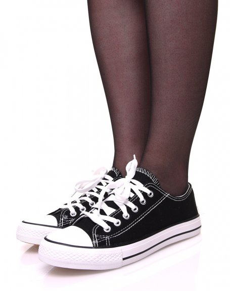 Black canvas sneakers with white laces and black trims