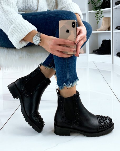 Black Chelsea boots with black embellishments