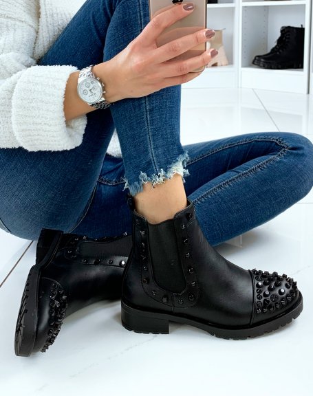 Black Chelsea boots with black embellishments