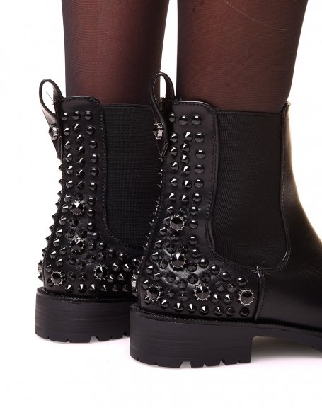 Black Chelsea boots with black studs and rhinestones
