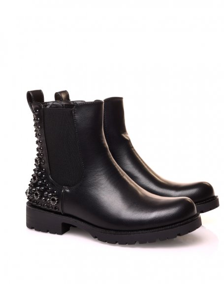 Black Chelsea boots with black studs and rhinestones