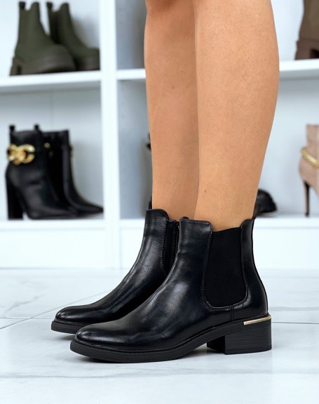 Black Chelsea boots with gold detail