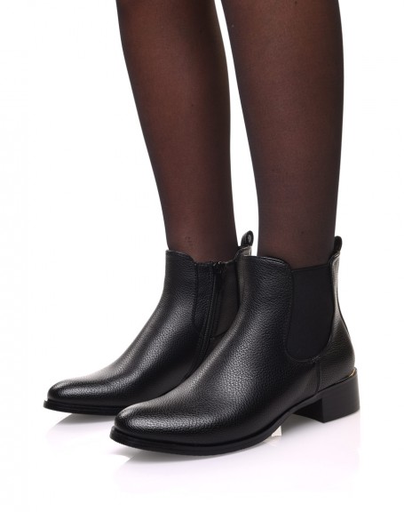 Black Chelsea boots with gold piping