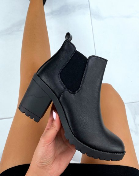 Black Chelsea boots with heels
