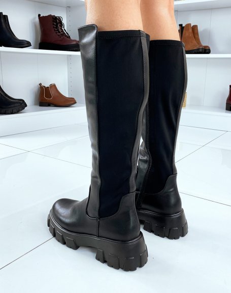 Black chelsea boots with lug soles