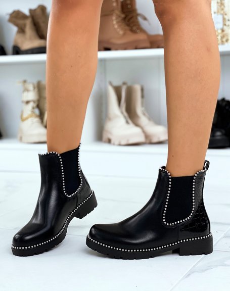 Black Chelsea boots with multiple silver studs and croc-effect back