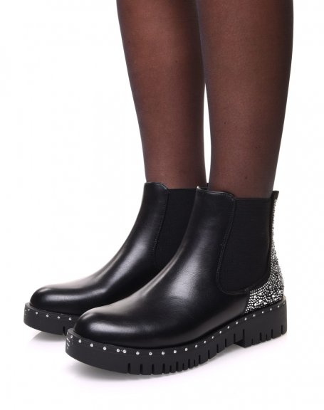 Black Chelsea boots with rhinestone details on the back