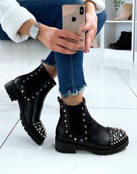 Black Chelsea boots with silver embellishments