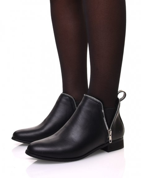 Black Chelsea boots with zipper details