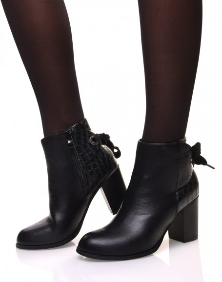 Black crocodile ankle boots with heel and bow details