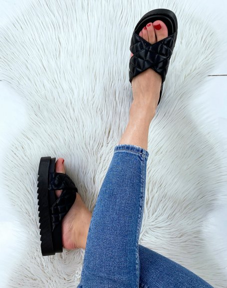 Black crossed and quilted mules