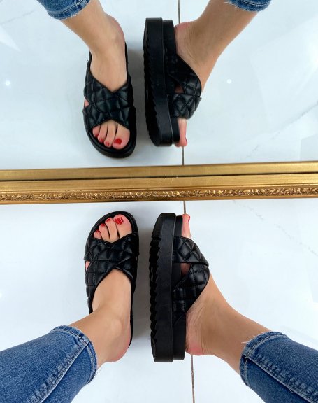 Black crossed and quilted mules