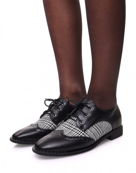 Black derby shoes with black and white patterns