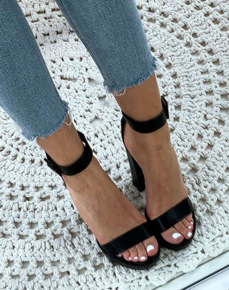 Black faux leather heeled sandals with lug soles