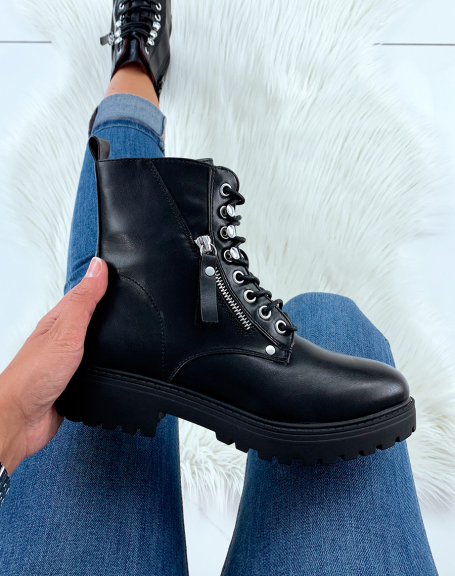 Black faux leather high ankle boots with lace up details and closures