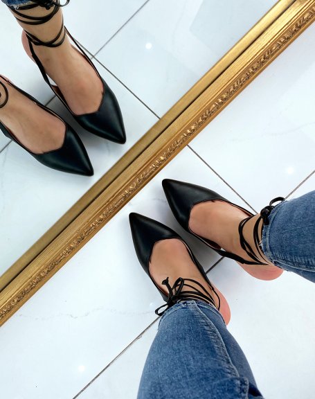 Black faux leather pumps open at the back