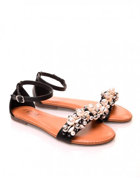 Black faux leather slippers with pearl and shell details