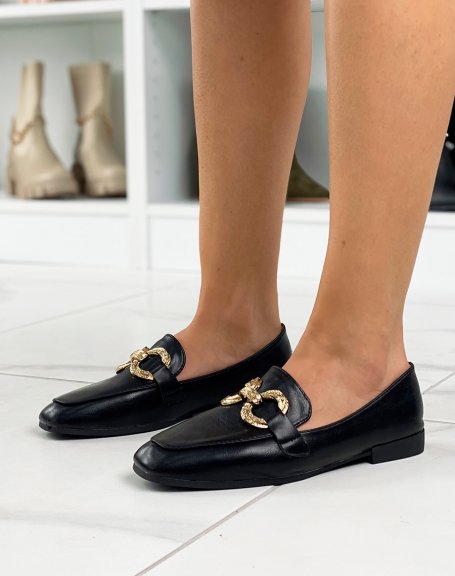 Black flat loafers with double golden buckles