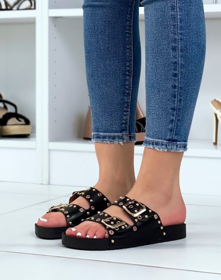 Black flat mules with adjustable straps and gold studs