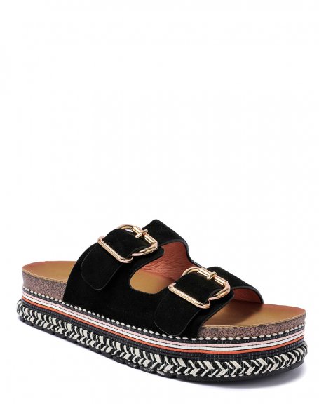 Black flat mules with double strap and Aztec sole