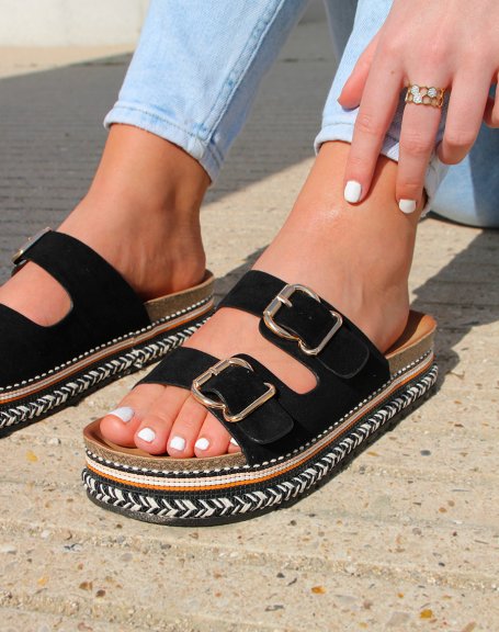 Black flat mules with double strap and Aztec sole