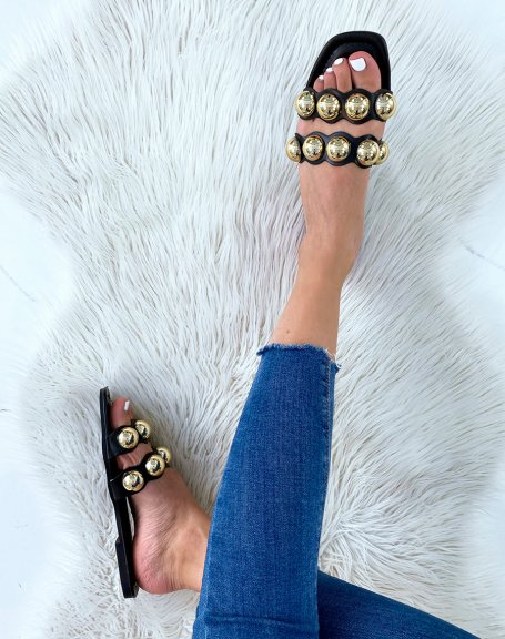 Black flat mules with double straps and golden pearls