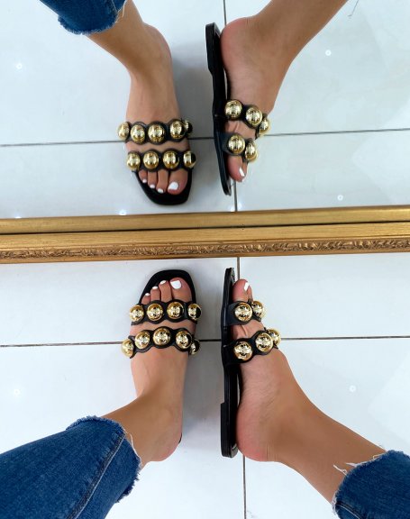 Black flat mules with double straps and golden pearls