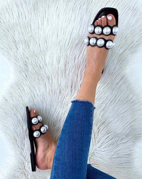 Black flat mules with double straps and white pearls