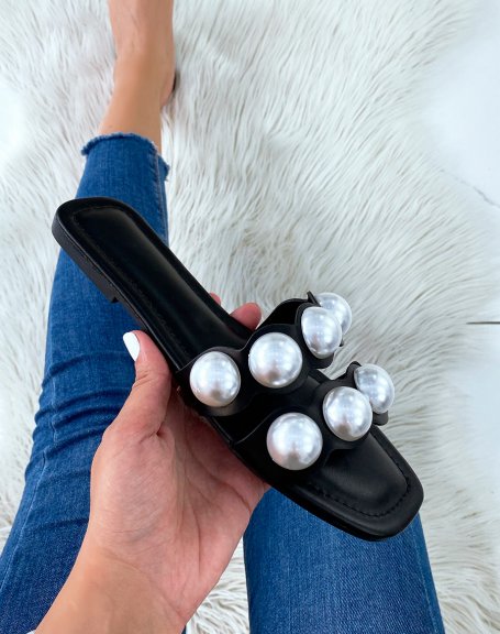 Black flat mules with double straps and white pearls