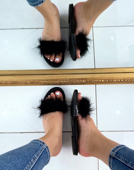 Black flat mules with feathers