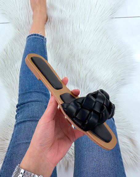 Black flat mules with large braided strap