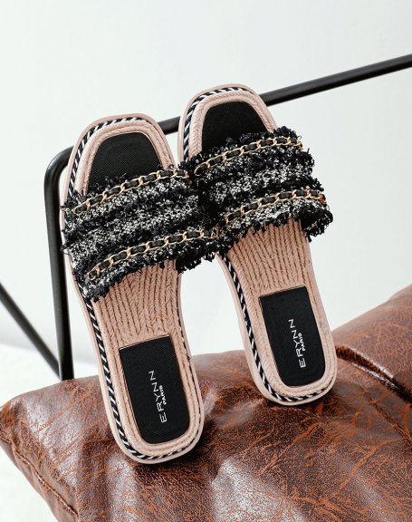 Black flat mules with multiple details and thin golden chain
