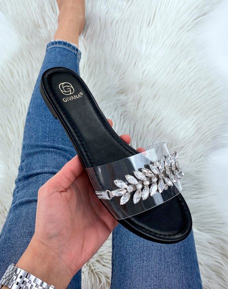 Black flat mules with silver leaf jewel detail